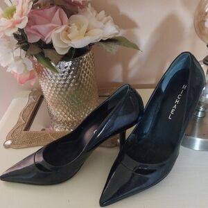 Black Patent Heels By Micheal